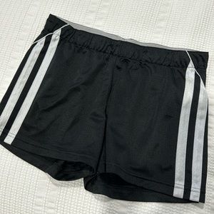 women’s adidas athletic shorts in black with white stripes. size M